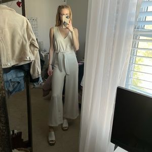 Cream jumpsuit in a size small from Lush for sale
